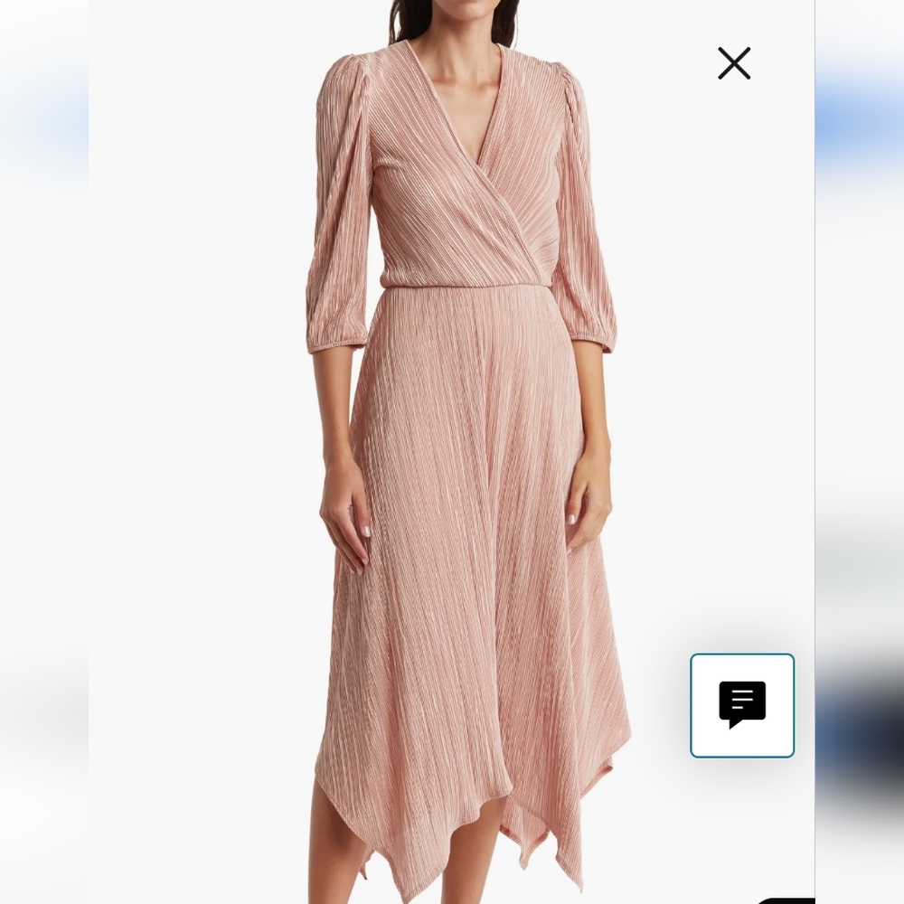 Brand new. Light pink 3/4 sleeved dress.